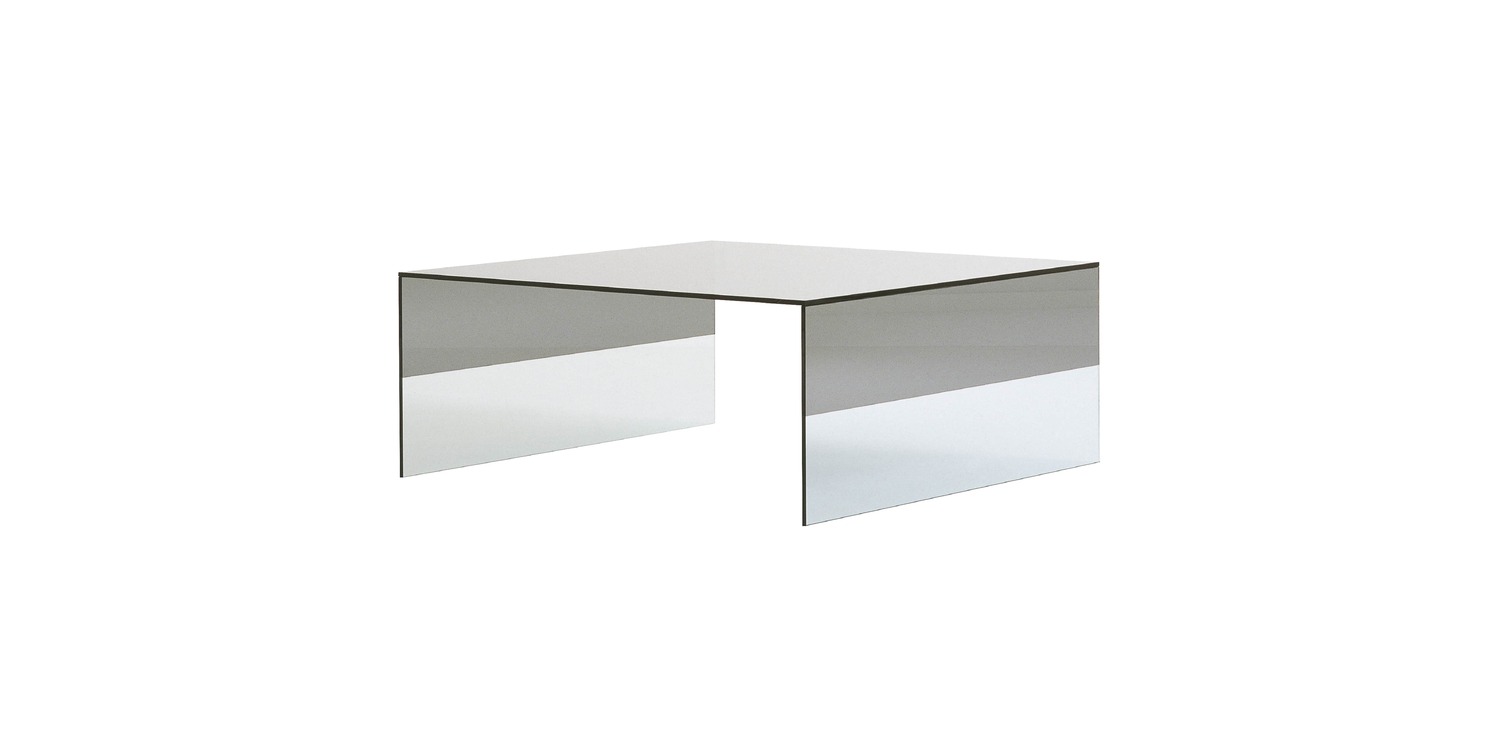 "Refined table design featuring smoky glass surface and minimalist structure – Cappellini Smoke."