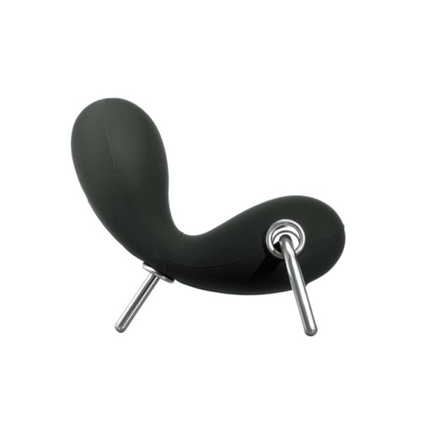 "White Embryo lounge chair in a studio setting, highlighting its soft curves and sinuous silhouette."