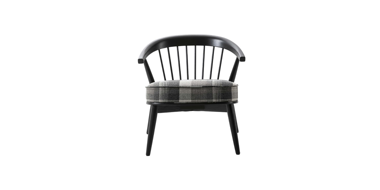 "Newood Relax seen from above, showcasing the curved plywood seat and snug upholstery."