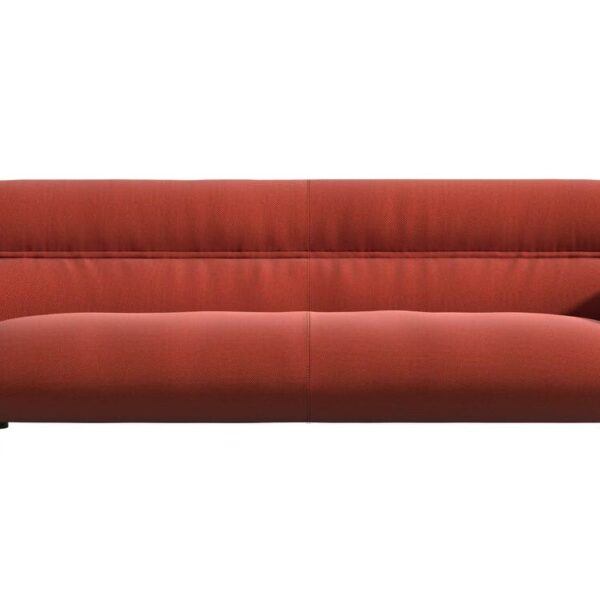 “Detail close‑up of Lud’o Sofa’s removable cover, pillowy form, and upholstery stitching over a recycled‑plastic frame.”