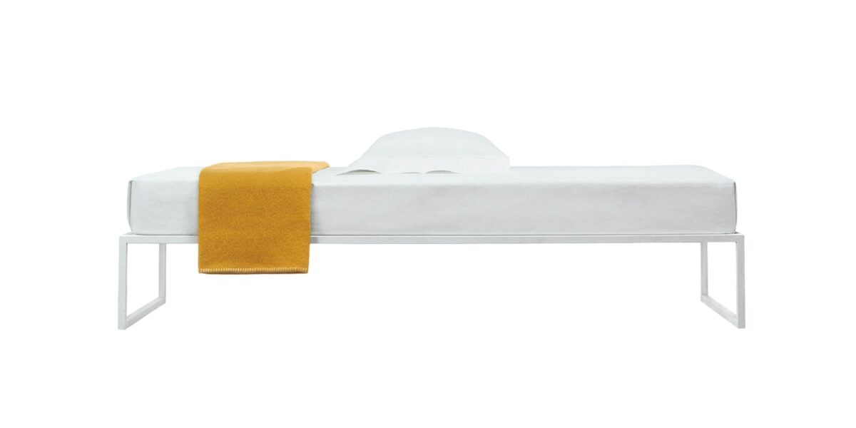 "Modern desk with open metal framework and elegant minimal design – Cappellini Fronzoni ’64."