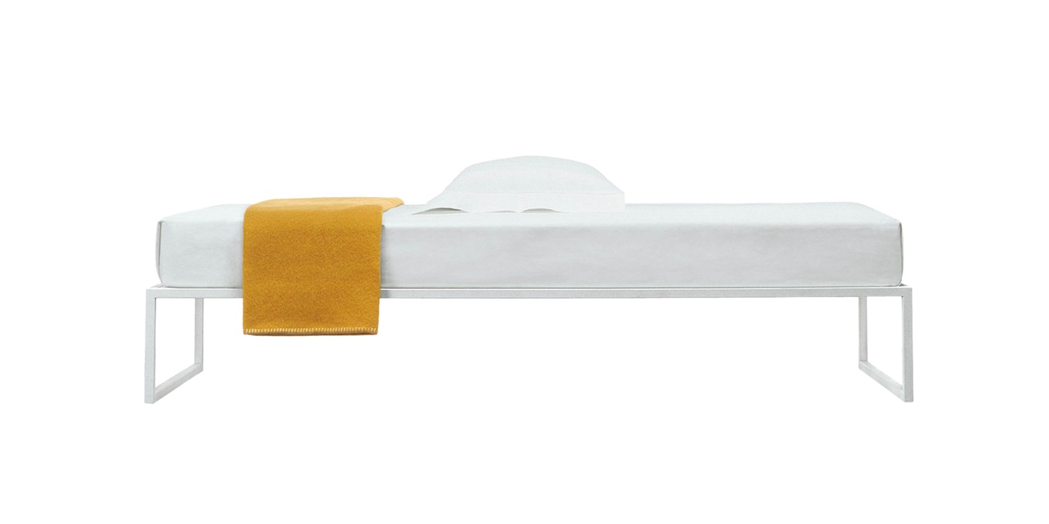 "Modern desk with open metal framework and elegant minimal design – Cappellini Fronzoni ’64."