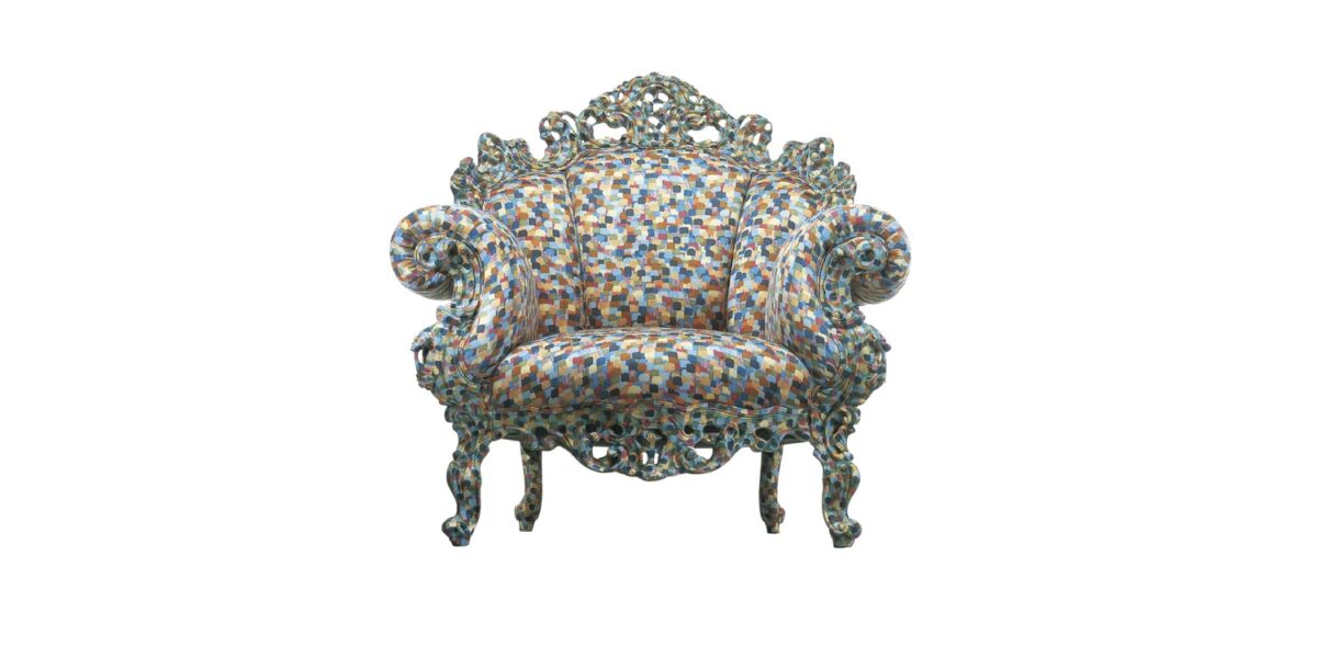 "Proust Geometrica variant with bold color blocks on hand-carved frame, placed in a contemporary interior."