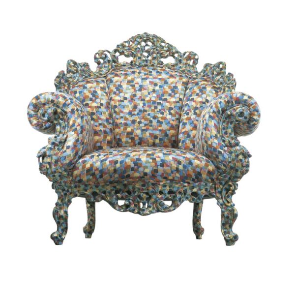 "Proust Geometrica variant with bold color blocks on hand-carved frame, placed in a contemporary interior."