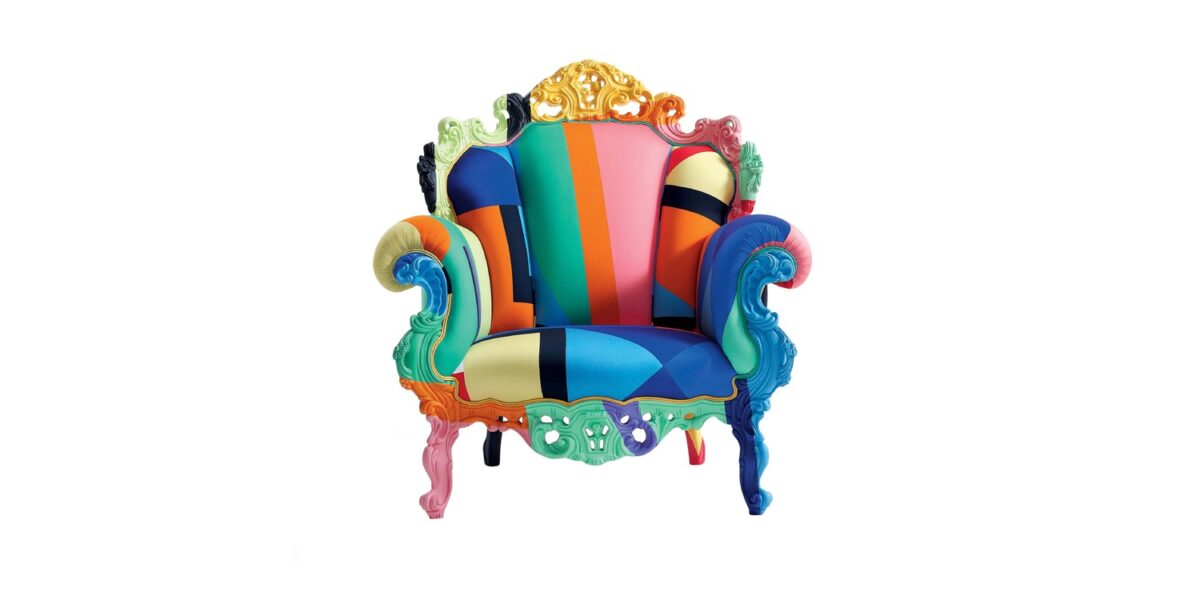"Angled top view revealing the vibrant cotton upholstery and ergonomic shape of the Proust Geometrica chair."