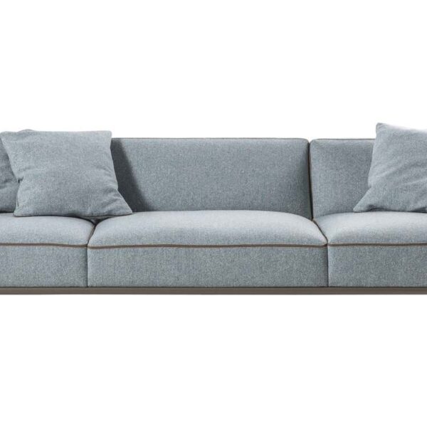“Cap Martin Sunset lounge setup in a bright interior, featuring detachable cushions and polished chrome base, evoking a vintage minimal aesthetic.”