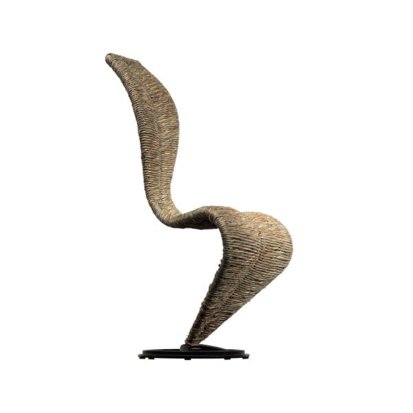"Detailed shot of the joint where the S‑Chair’s tubular legs meet the woven seat, highlighting industrial finishing."