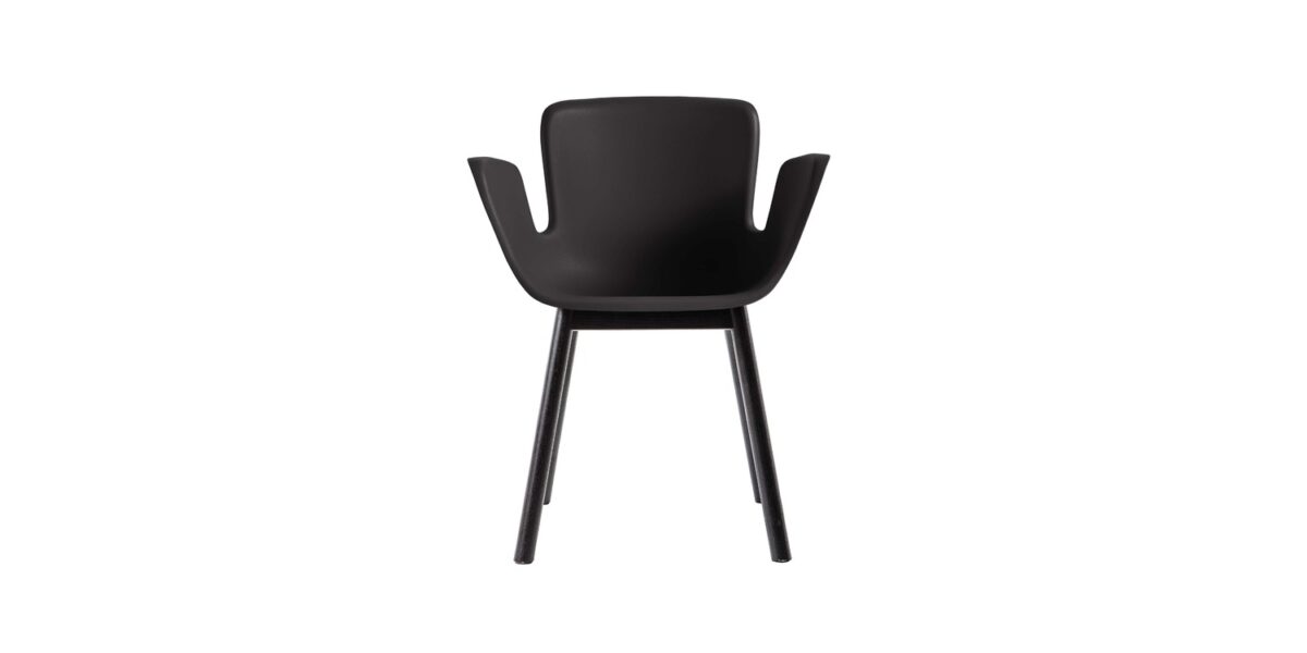 "Rear three-quarter view of green Juli Plastic showing its smooth back and sled-style metal frame."