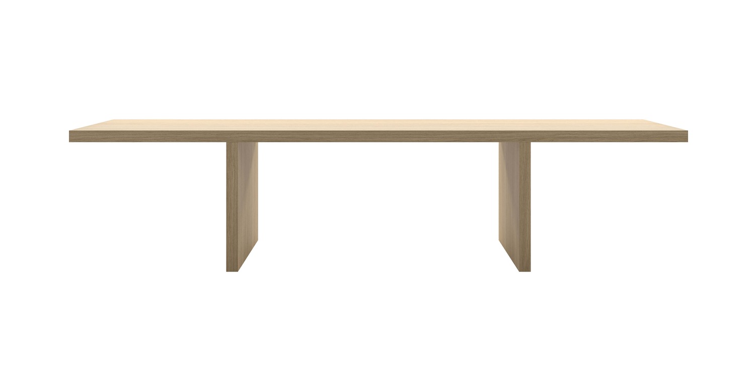 “Room setting featuring the natural oak Millenium Hope table in a minimalist dining area, its solid presence anchoring the space.”
