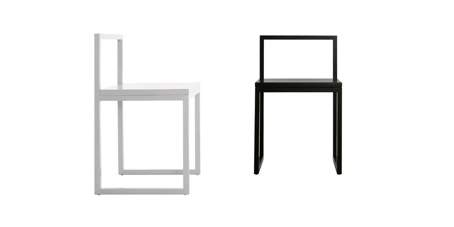 "Fronzoni '64 Chair in a gallery space, its minimalist design enhancing the surrounding artwork."