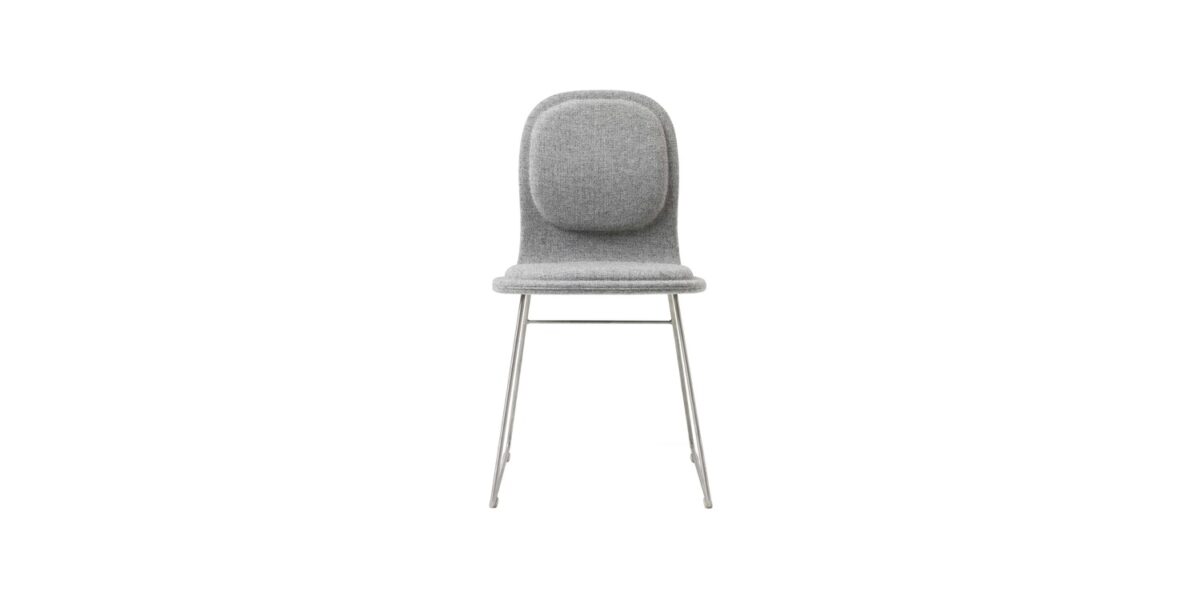 "Hi Pad stool in a cafe setting, highlighting its sleek design and durable construction."