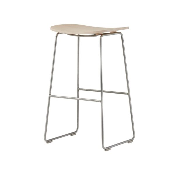 “Detail shot of footrest support brace and polypropylene foot caps beneath a high Morrison Stool.”