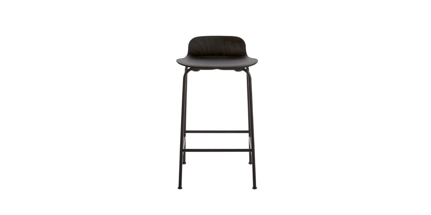 “Detail view of the seat-to-leg junction on a petrol-blue Tate Color stool mounted on a sled-style base.”