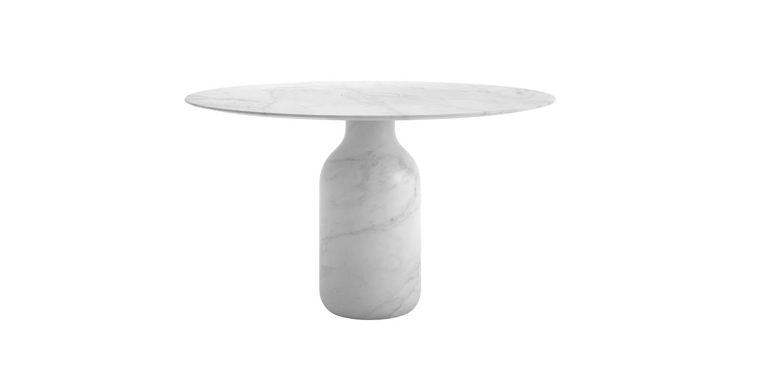 “Detail of tabletop’s rim and base junction, revealing the precision in carved marble craftsmanship.”