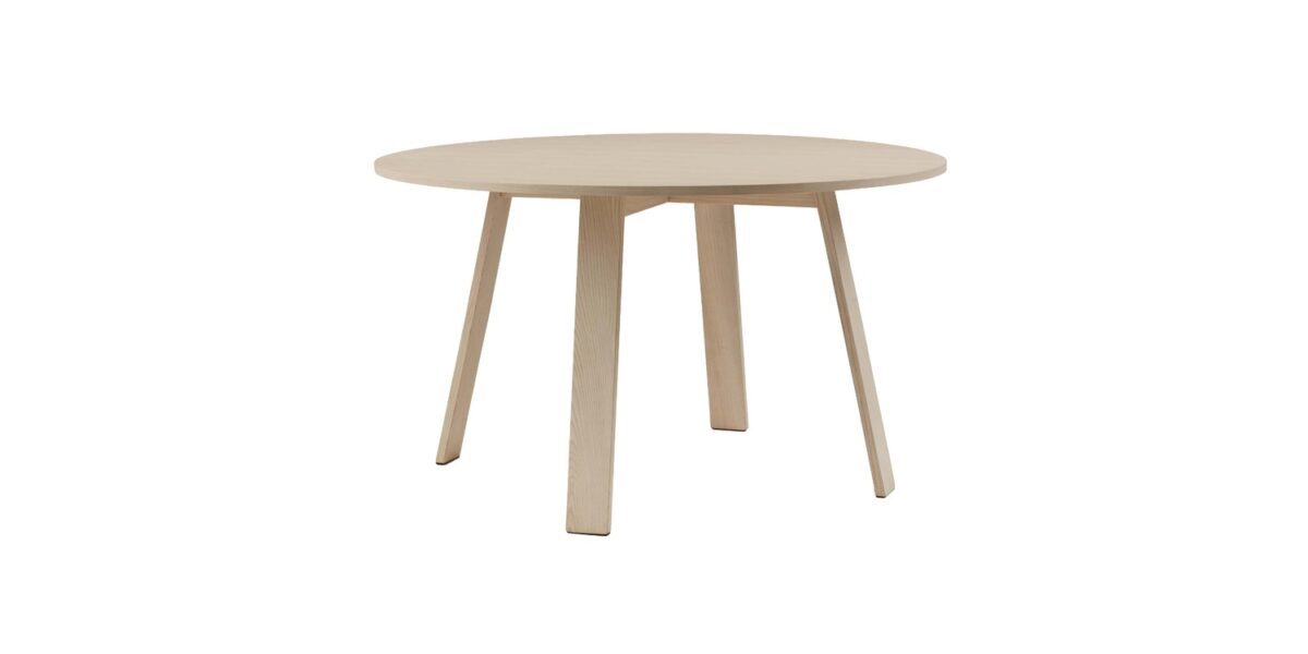 “Rear view of blue-stained ash Bac Table, emphasizing its monochrome finish and the solidity of its base.”