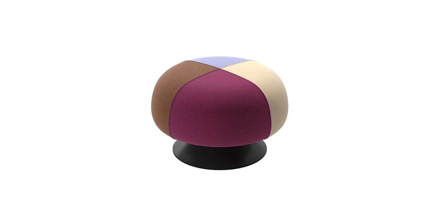 “Cozy corner with Lud’o Pouf upholstered in mustard fabric, featuring soft rounded form and padded seat.”