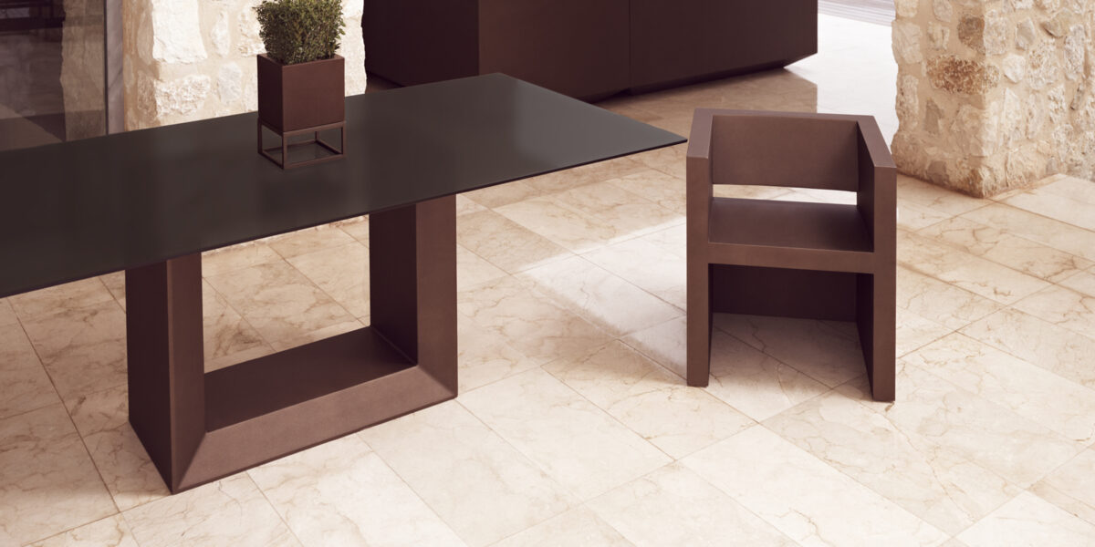 "Contemporary Vondom VELA table designed with modular style and sleek design aesthetics."