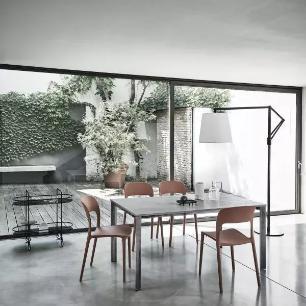 Dublin extendable dining table by Bontempi Casa featuring a sleek metal frame and melamine top in Concrete Sand finish.