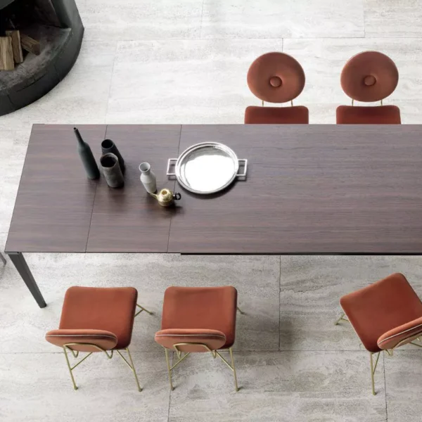 Echo In by Bontempi – rectangular dining table with matte anthracite metal legs and walnut veneer top in extended state.