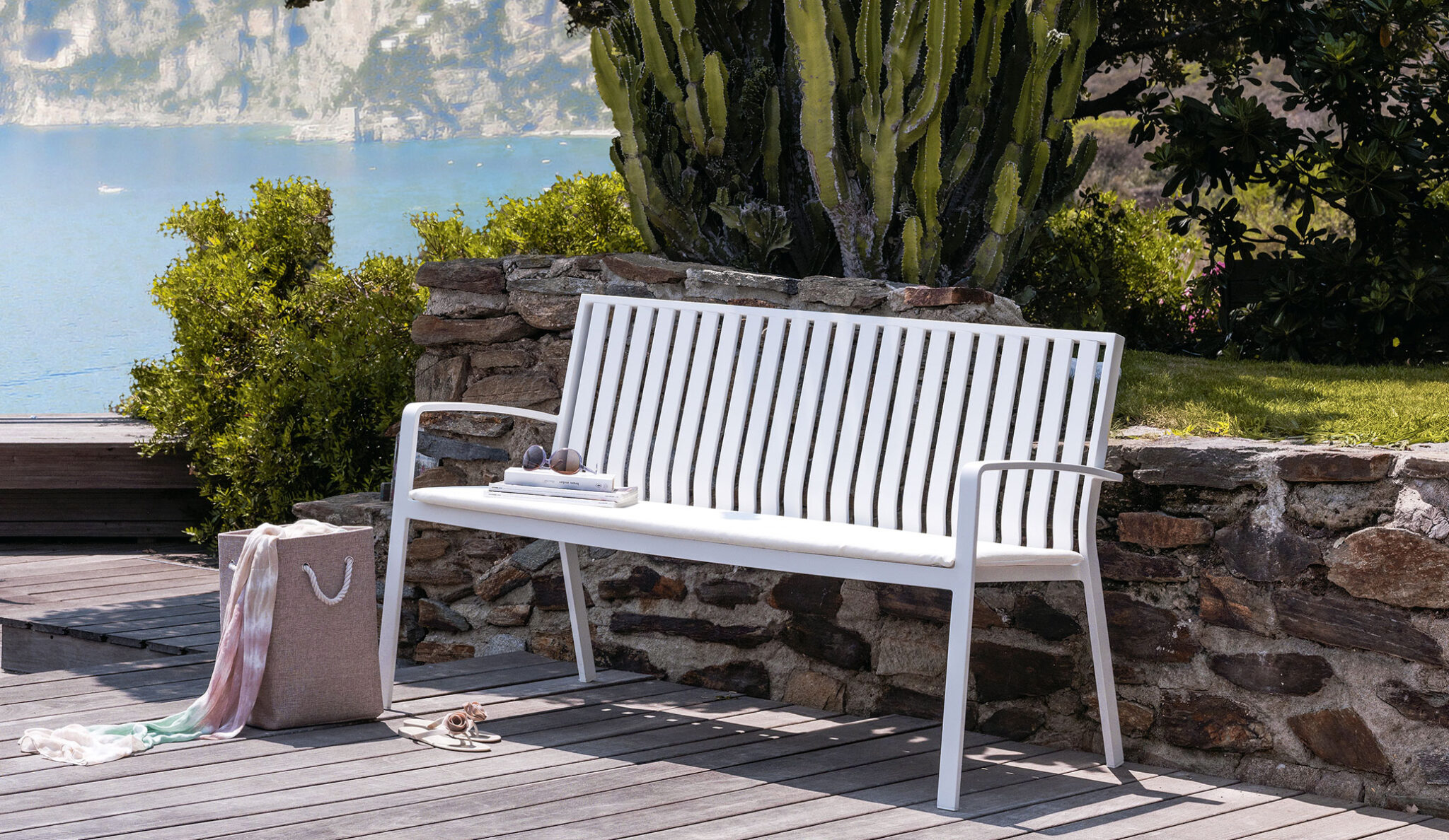 Lady Bench by Talenti – elegant outdoor bench with sleek frame and plush cushioning