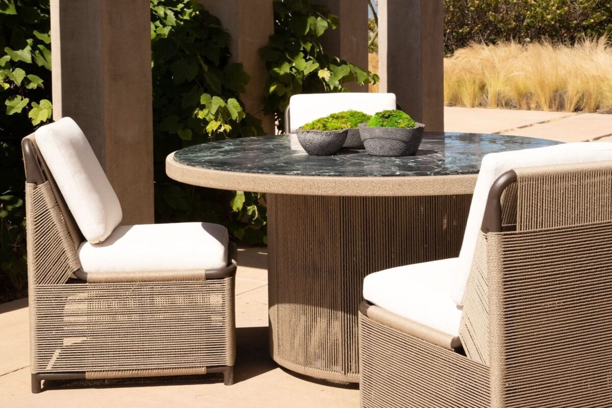 “Formentera round outdoor dining table by Harbour – luxury teak design for contemporary patios”