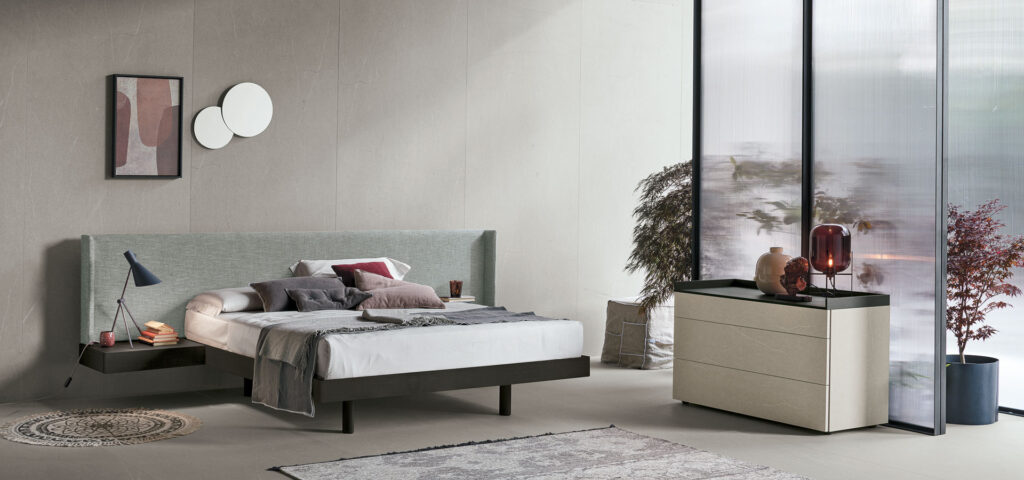 “Fusion bed by Tomasella – modern Italian bed with upholstered headboard featuring vertical panels and clean-lined base”