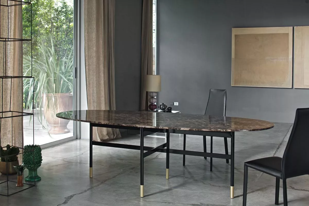 Glamour by Bontempi – Ø150 cm round dining table with glossy black SuperMarble top and cross-braced lacquered steel legs with contrasting metal feet.