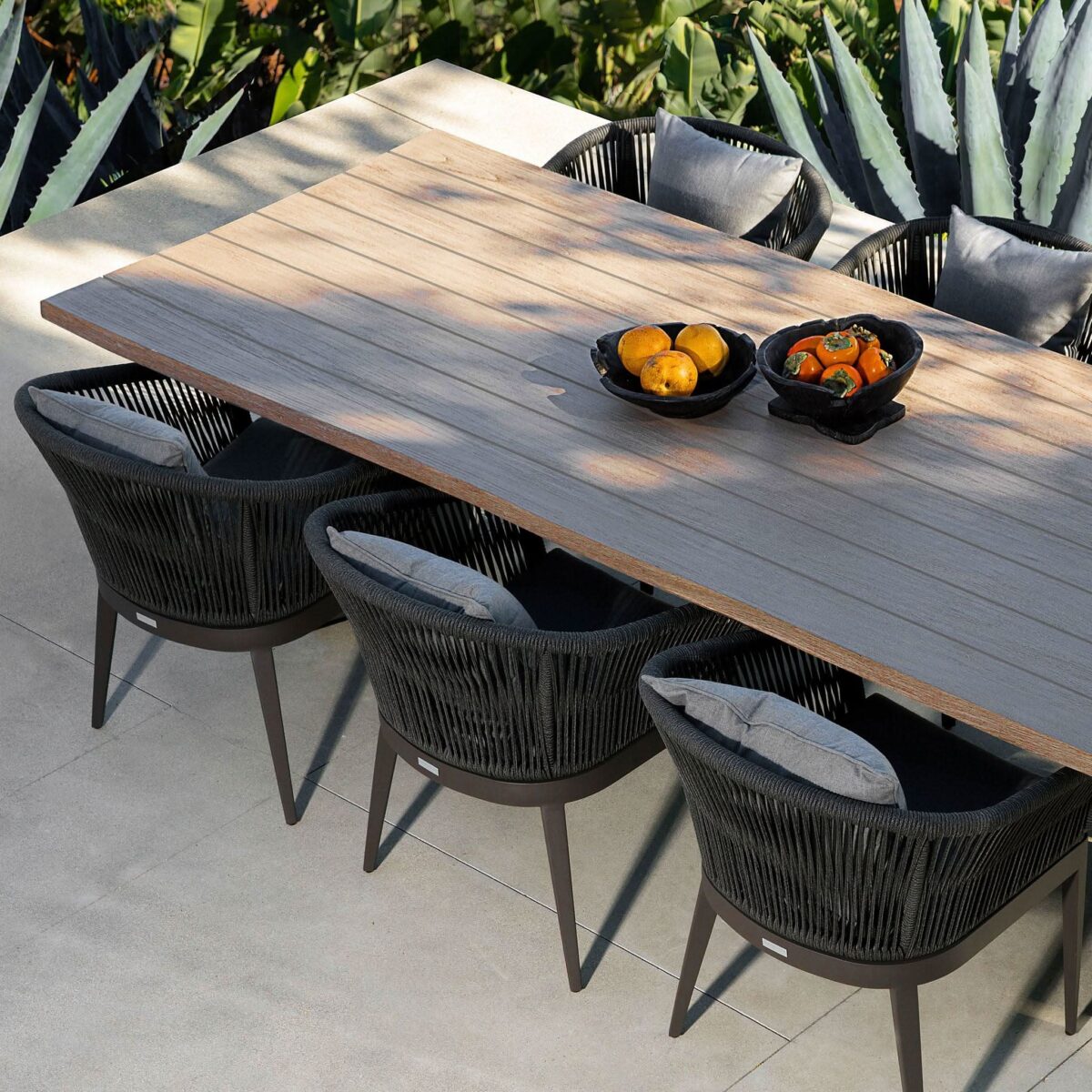 “Contemporary patio dining chair – Hamilton by Harbour in durable construction with arm supports”