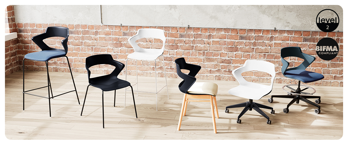 “Zee chair by Via Seating with modern curved frame at Royal Oak showroom”