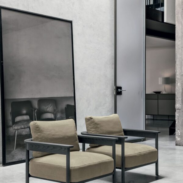 “Hood mirror by Tomasella – modern Italian wall mirror with distinctive hooded frame and minimalist design”