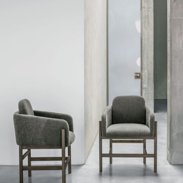 “Hood chair by Tomasella – modern Italian chair with high curved backrest and elegant upholstered design”