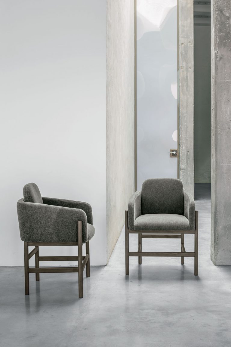 “Hood chair by Tomasella – modern Italian chair with high curved backrest and elegant upholstered design”