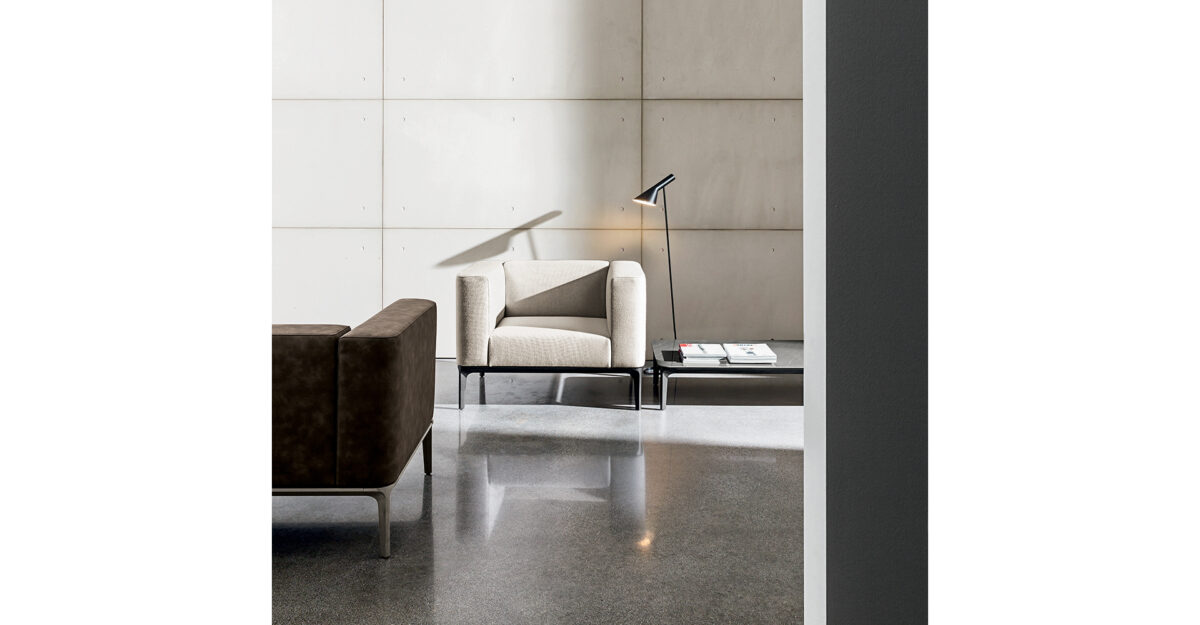 “Slim designer sofa by Sovet – stylish Italian seating with clean design and comfortable cushioning”