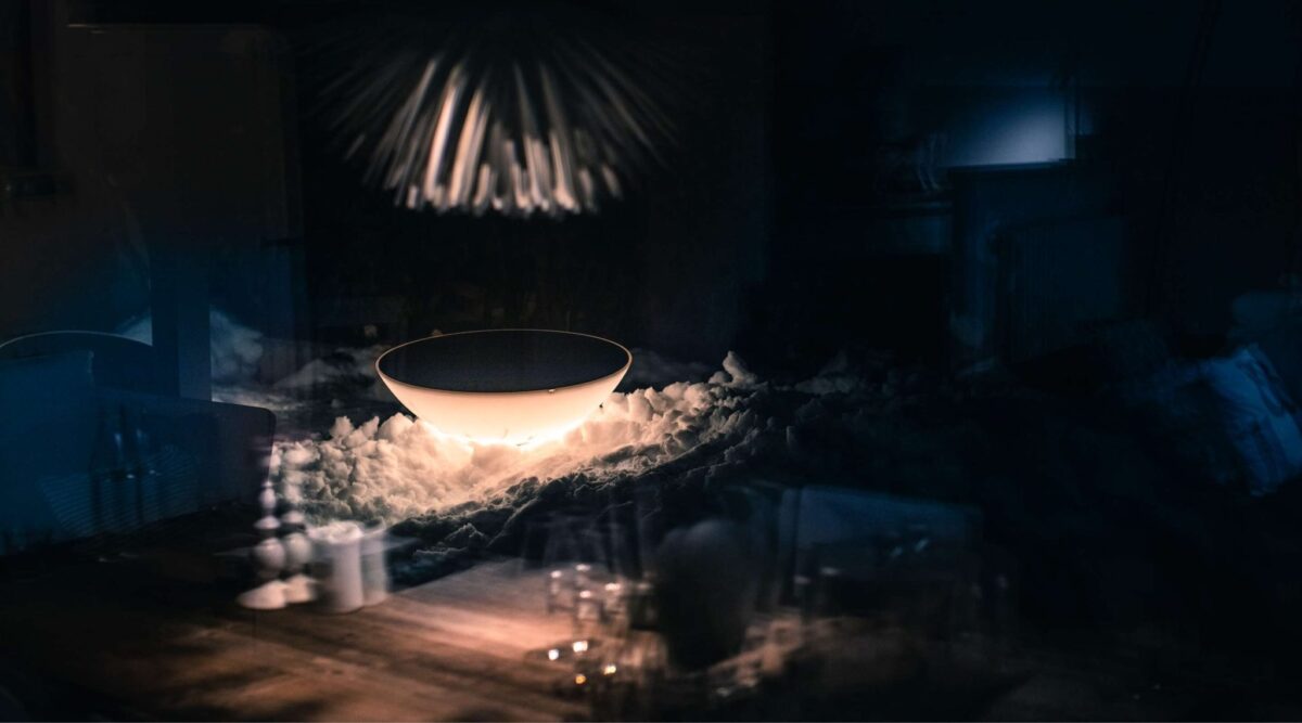 Modern Sthelar by Foscarini illuminates a minimalist space in Birmingham, Michigan.