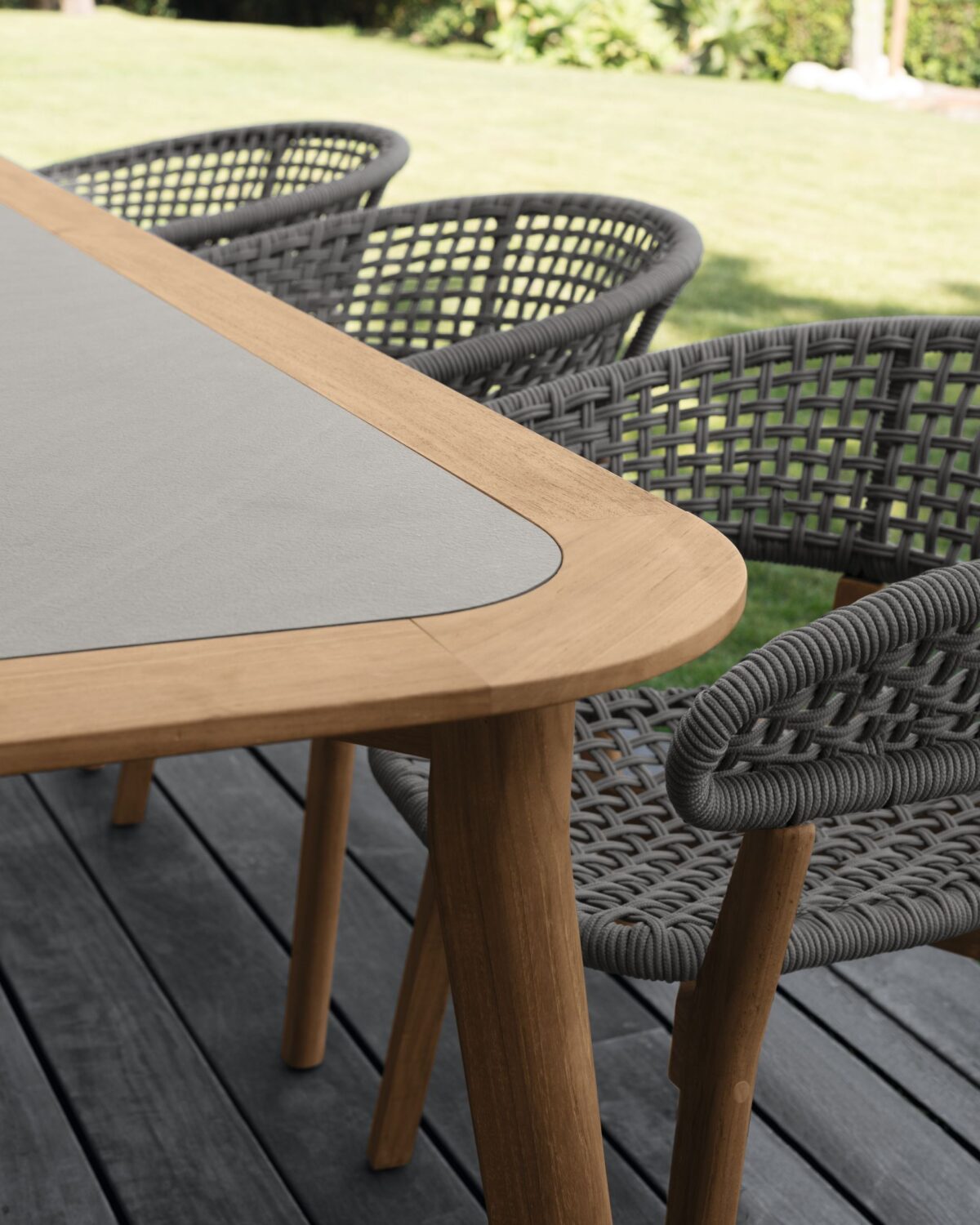 Contemporary Moon//Teak Outdoor Dining Table by Talenti offering natural wood warmth with sleek Italian styling