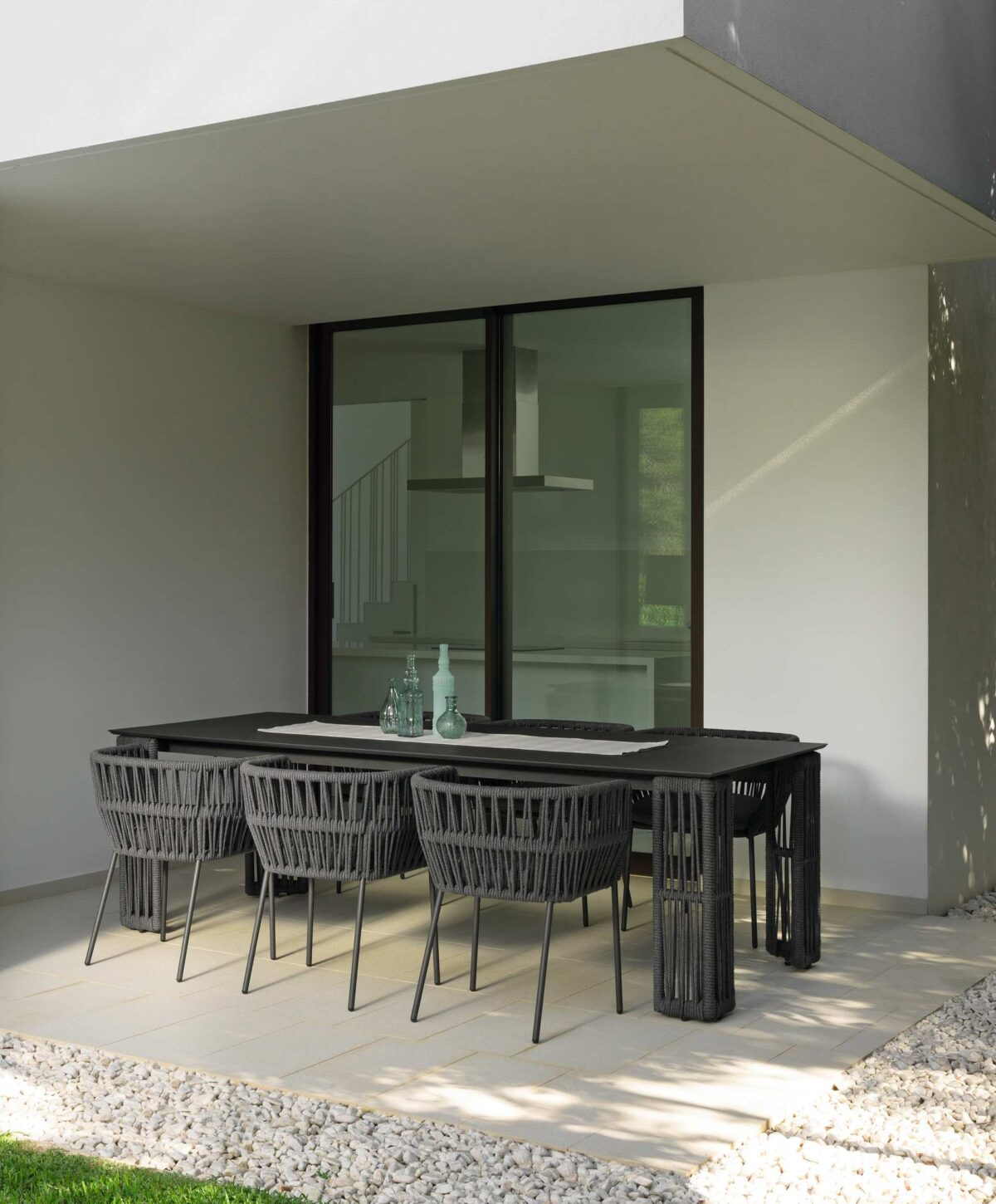 Designer Talenti Cliff Armchair offering sophisticated outdoor seating with handmade rope accents