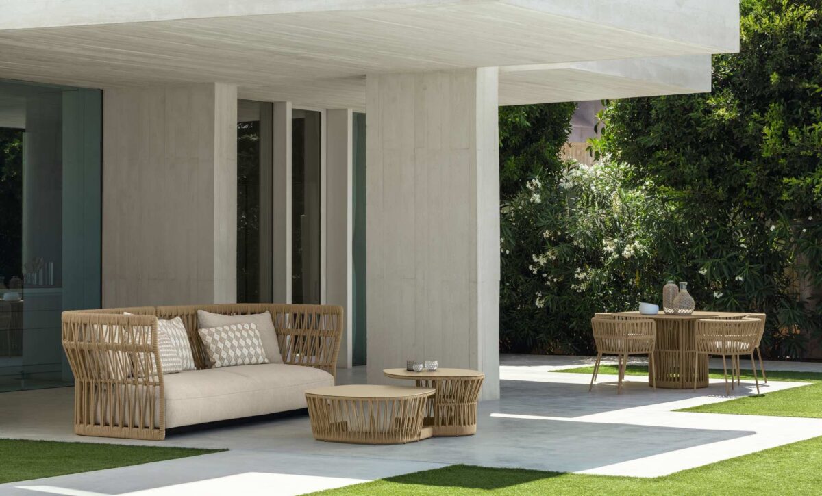 Talenti Cliff Dining Armchair featuring curved backrest and weather-resistant materials for Royal Oak, Michigan patios