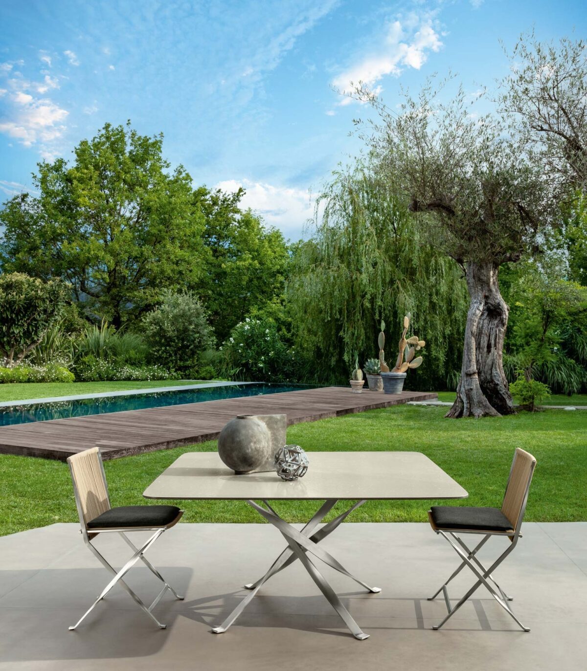 Designer Talenti George Dining Armchair offering comfort and sophistication for Troy, Michigan outdoor spaces