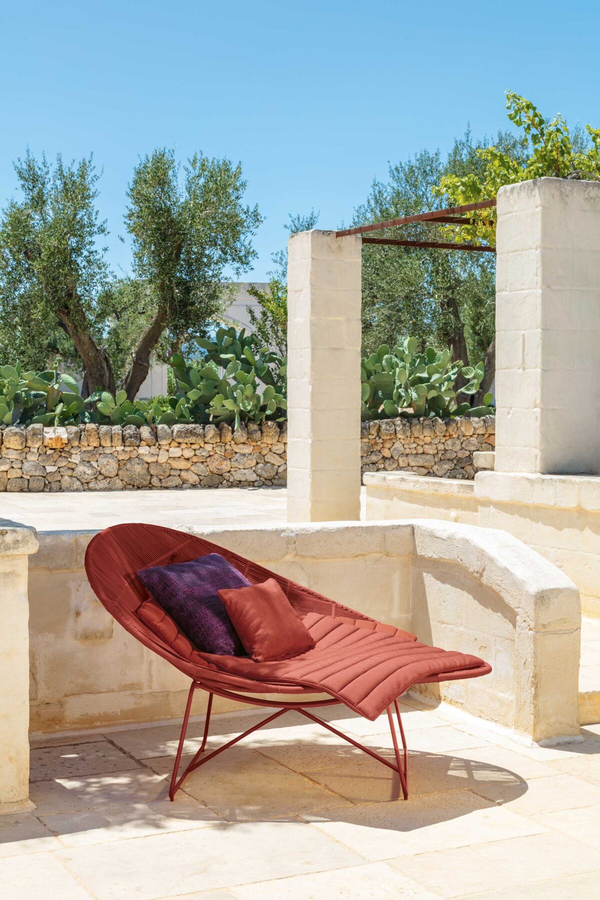 Luxury outdoor lounge chair from Talenti’s Panama collection offering a low, wide frame and plush cushions in Troy, Michigan