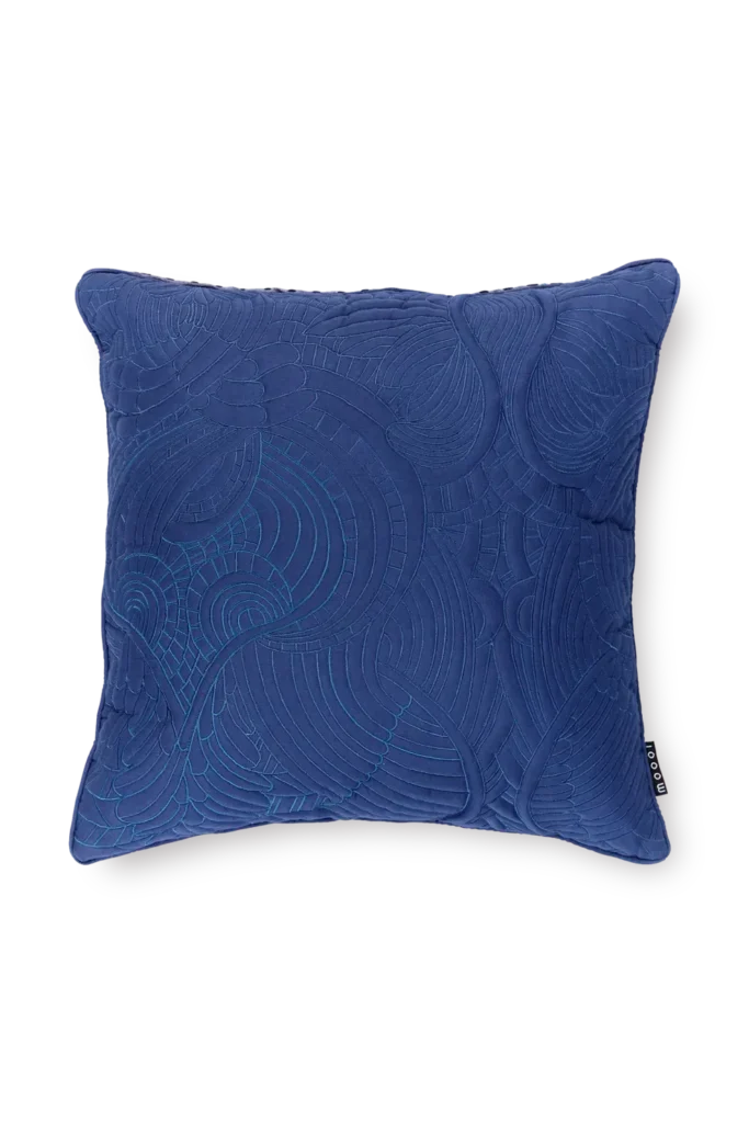 Flying Coral Fish pillow by Moooi on modern sofa