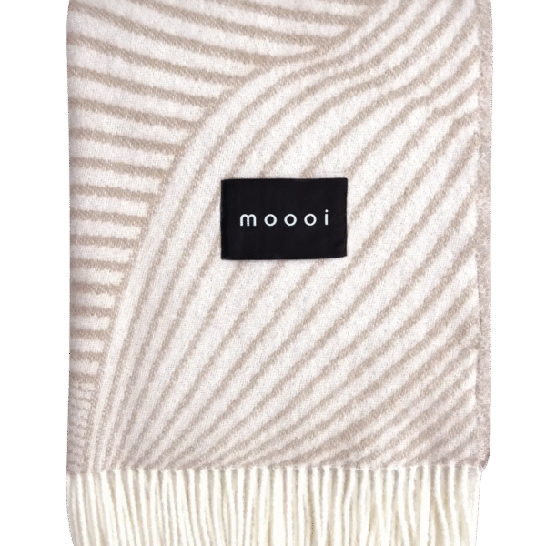 Techno Bee Blanket by Moooi in Coffee Cream, featuring jacquard-woven 100% New Zealand wool with mesmerizing wing-inspired patterns, displayed in Royal Oak, Michigan showroom.