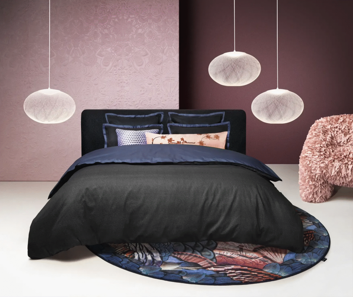 Calligraphy Bird Bed Pillows by Moooi in deep blue, featuring jacquard-woven 100% cotton sateen with subtle feather patterns, displayed in Royal Oak, Michigan showroom.