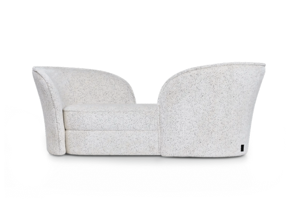 Aldora Vis a Vis sofa by Moooi with sculptural calla lily-inspired backrests, upholstered in Abbracci fabric, displayed in Royal Oak, Michigan.