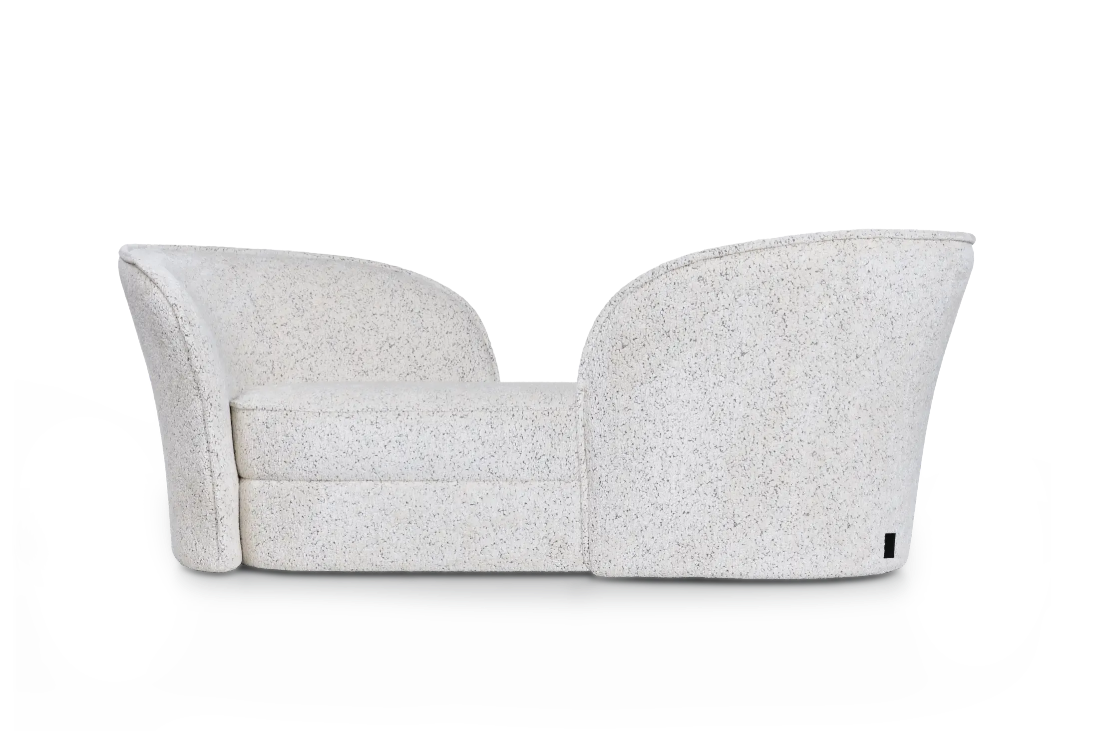 Aldora Vis a Vis sofa by Moooi with sculptural calla lily-inspired backrests, upholstered in Abbracci fabric, displayed in Royal Oak, Michigan.