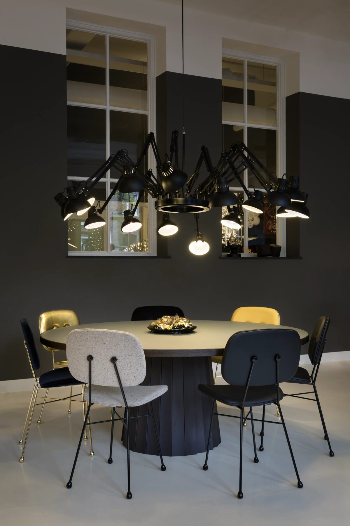 Sculptural Dear Ingo chandelier by Moooi, designed by Ron Gilad, featuring 16 adjustable lamps in a dynamic arrangement, available in Royal Oak, Michigan.