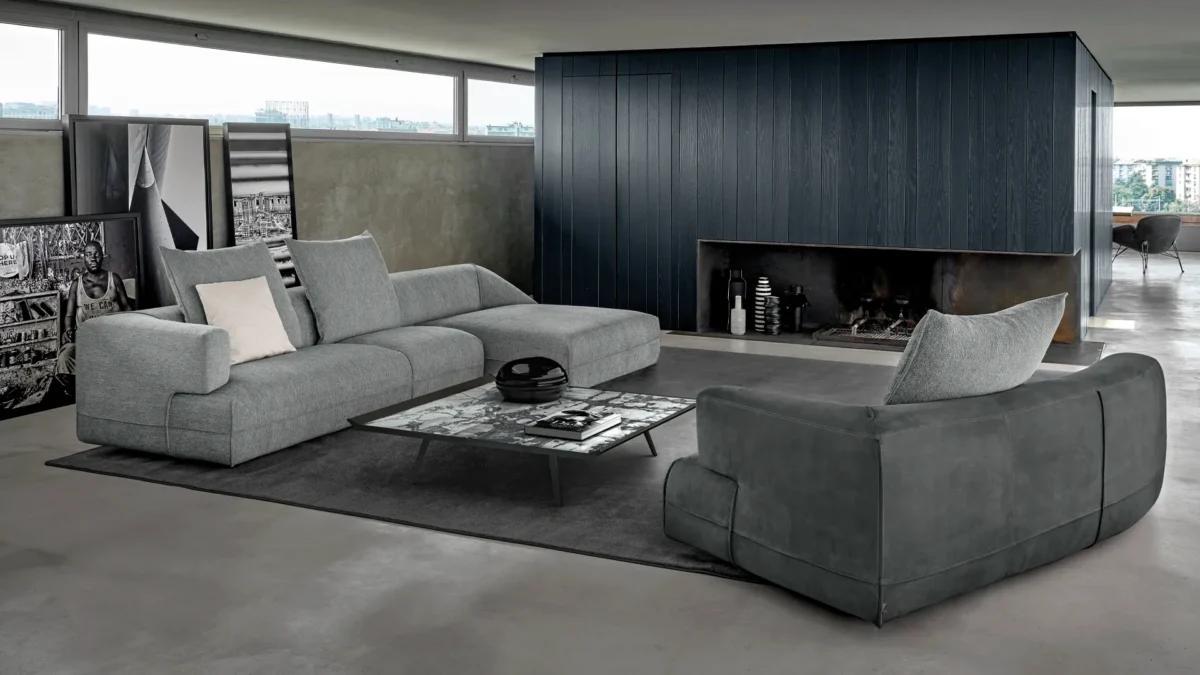 High-end Starman sofa by Arketipo with minimalist steel legs and soft upholstery
