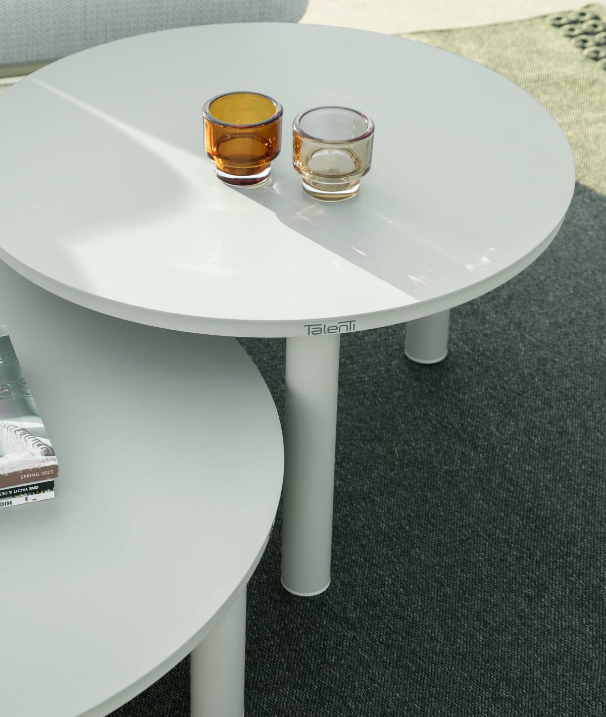 Modern outdoor Lisa Living Armchair by Talenti with weather-resistant materials on a patio in Royal Oak, Michigan