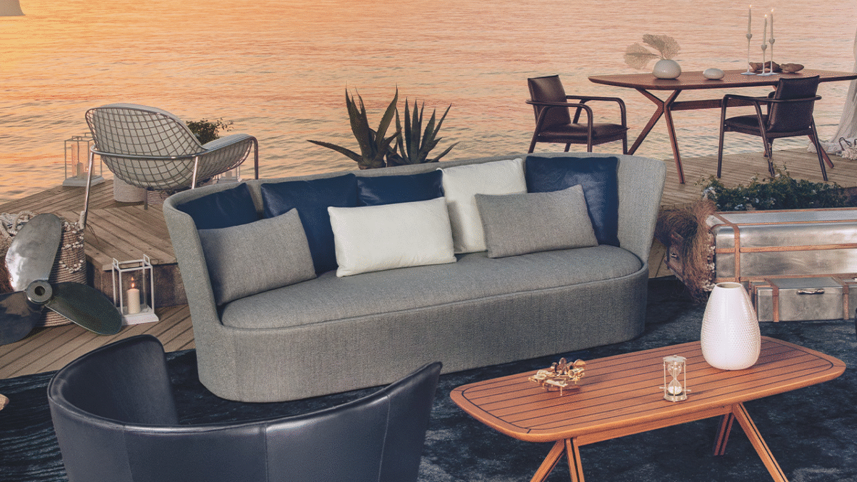 Cape armchair by Natuzzi Italia in dark green fabric, designed by Marcel Wanders, displayed in Royal Oak, Michigan.