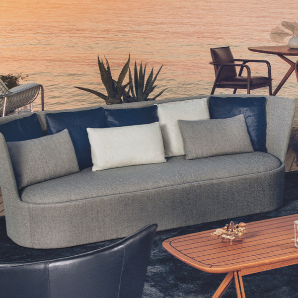 Cape armchair by Natuzzi Italia in dark green fabric, designed by Marcel Wanders, displayed in Royal Oak, Michigan.