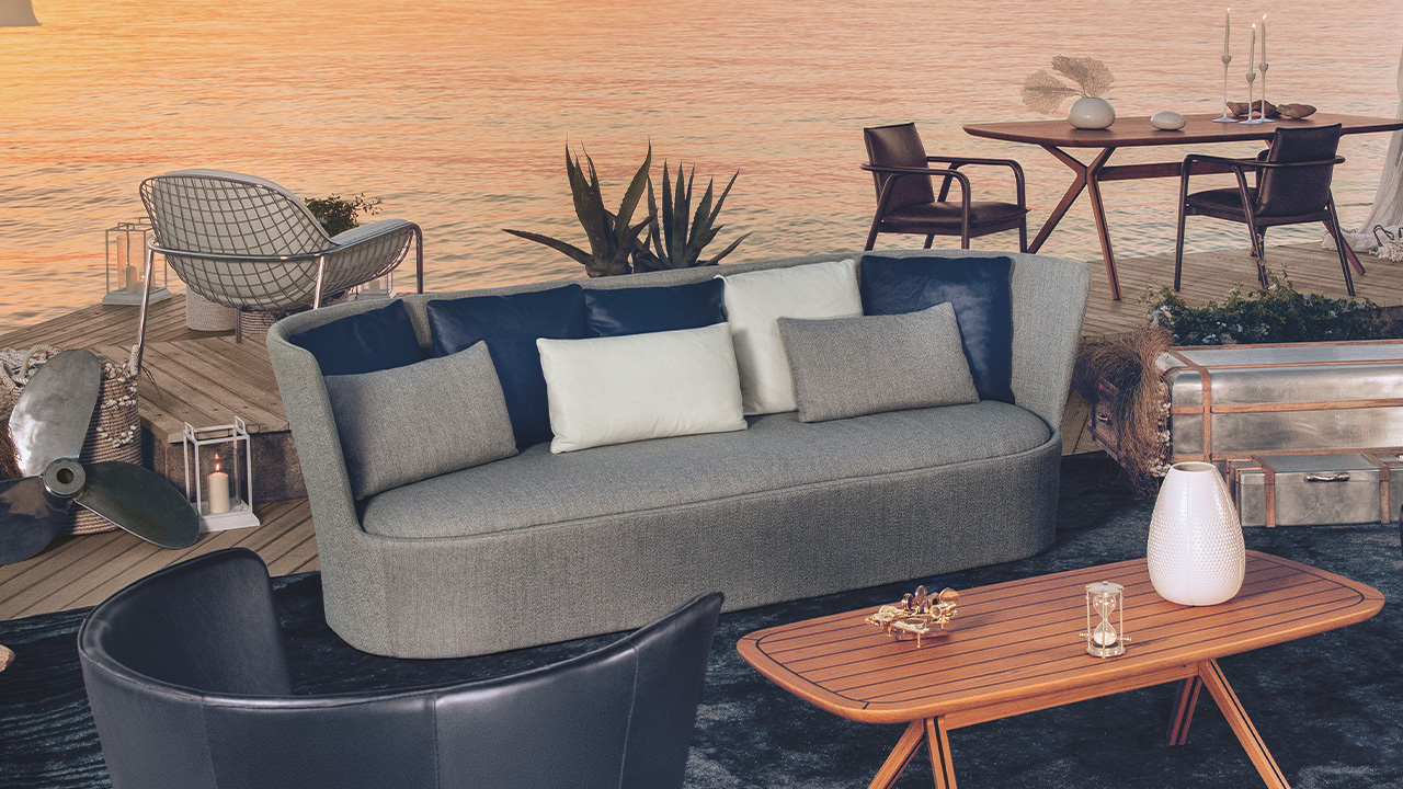 Cape armchair by Natuzzi Italia in dark green fabric, designed by Marcel Wanders, displayed in Royal Oak, Michigan.